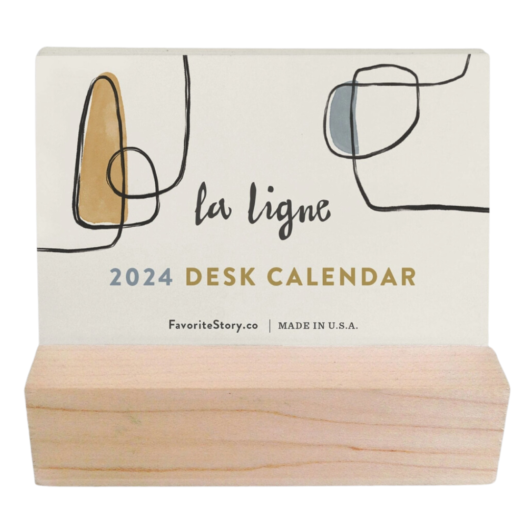 2024 mini desk calendar on a stylish wooden base - a chic and functional addition to your workspace.