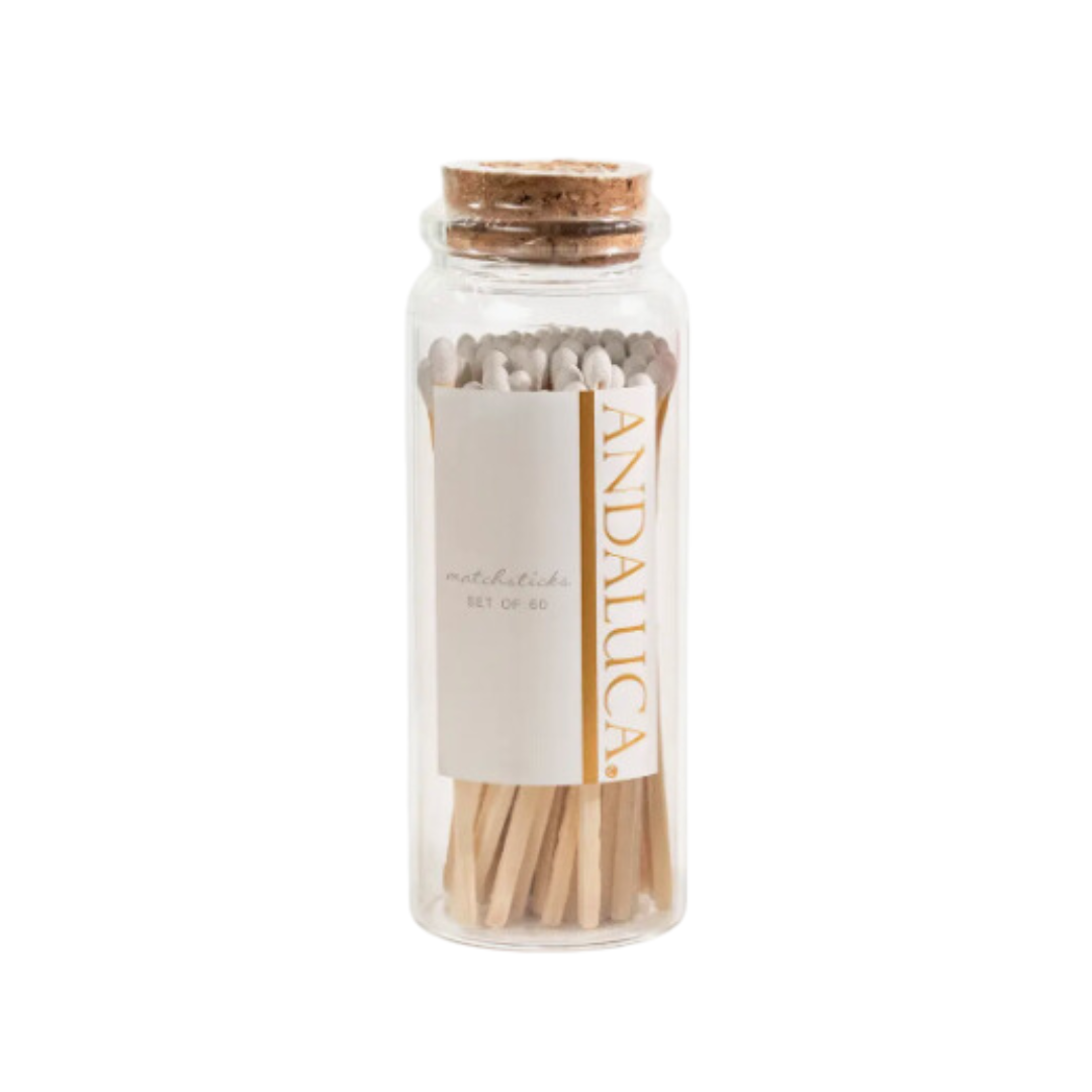 Elegant glass bottle filled with white tipped matches, sealed with a cork top – a perfect addition to your personalized gift box at Me To You Box.