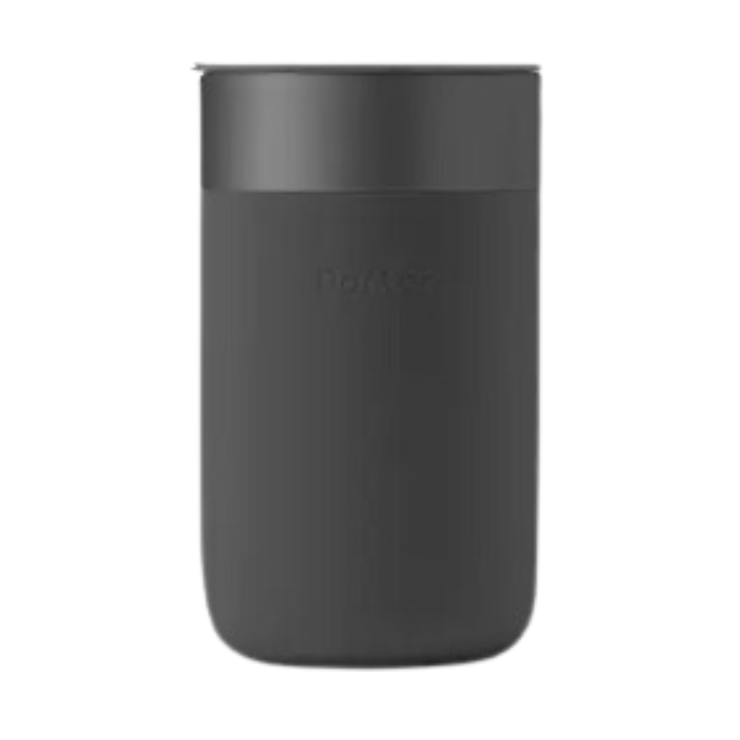 W&P 20oz reusable black silicone wrapped ceramic coffee mug with sliding closure lid.