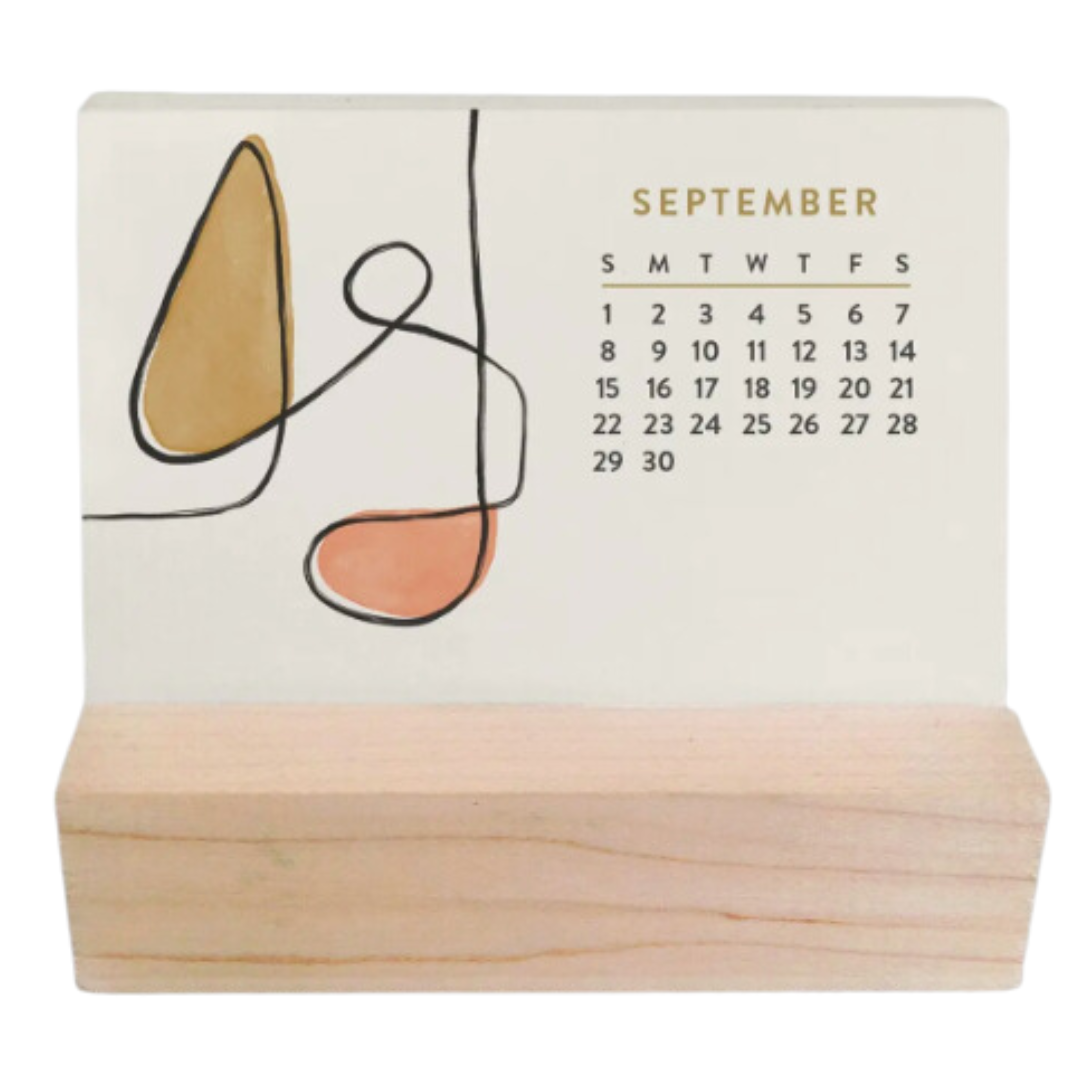Elevate your desk with the 2024 mini desk calendar and its elegant wooden base.