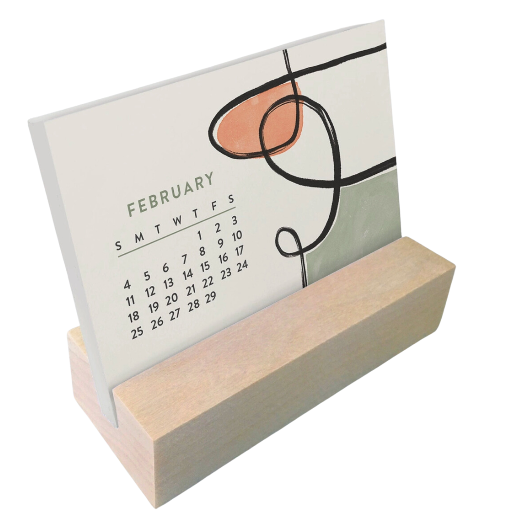 Stay organized with the 2024 mini desk calendar featuring a sleek wooden base.