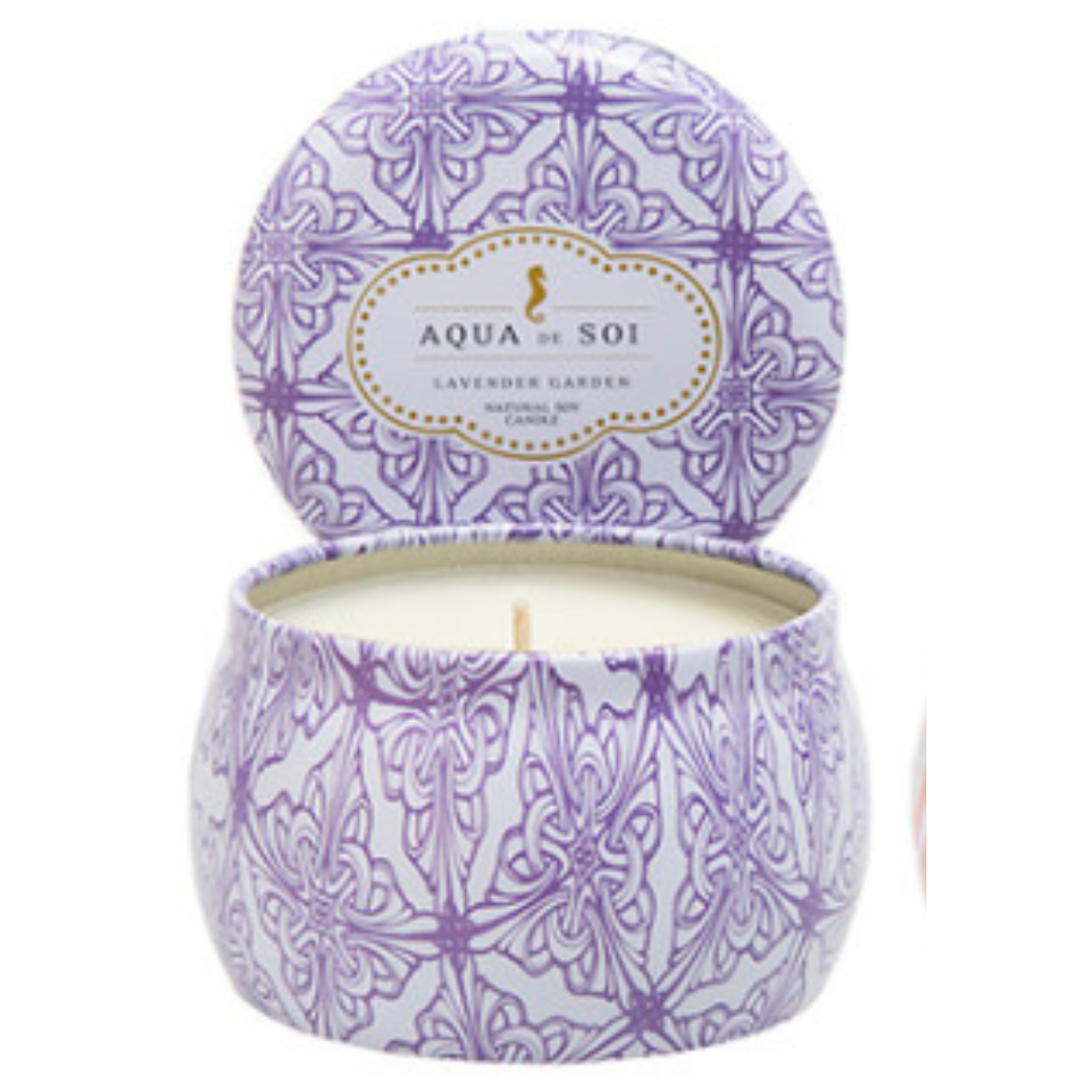 Lavender garden soy wax candle in 4oz tin, soothing fragrance for relaxation and decor in lavender and white packaging.
