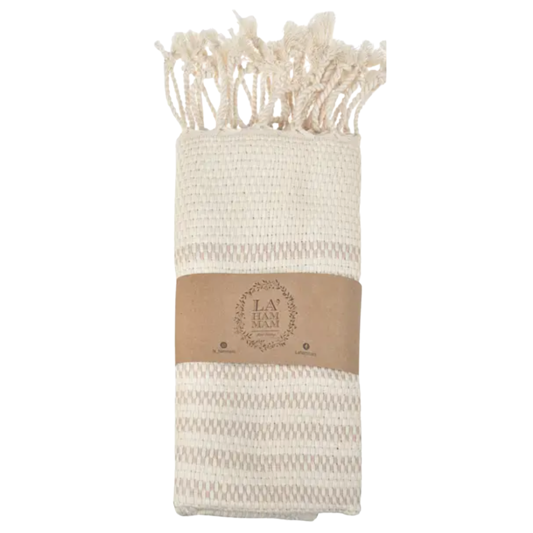 Luxurious Turkish cotton hand towel in cream and beige, measuring 40" x 18" for a soft and stylish addition to your kitchen.