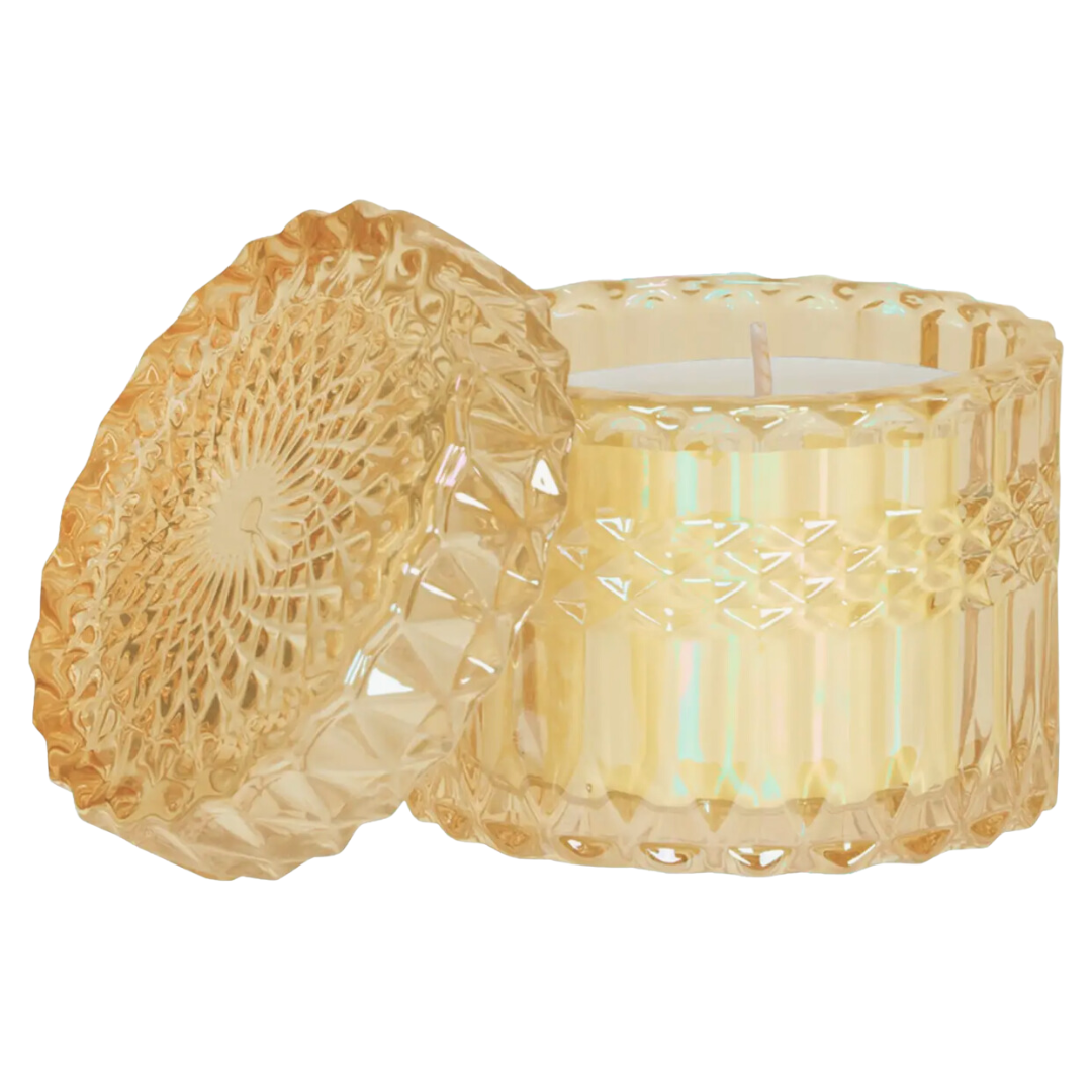 8oz yellow cut glass soy wax candle with matching glass lid, perfect for adding warmth and ambiance to any space.