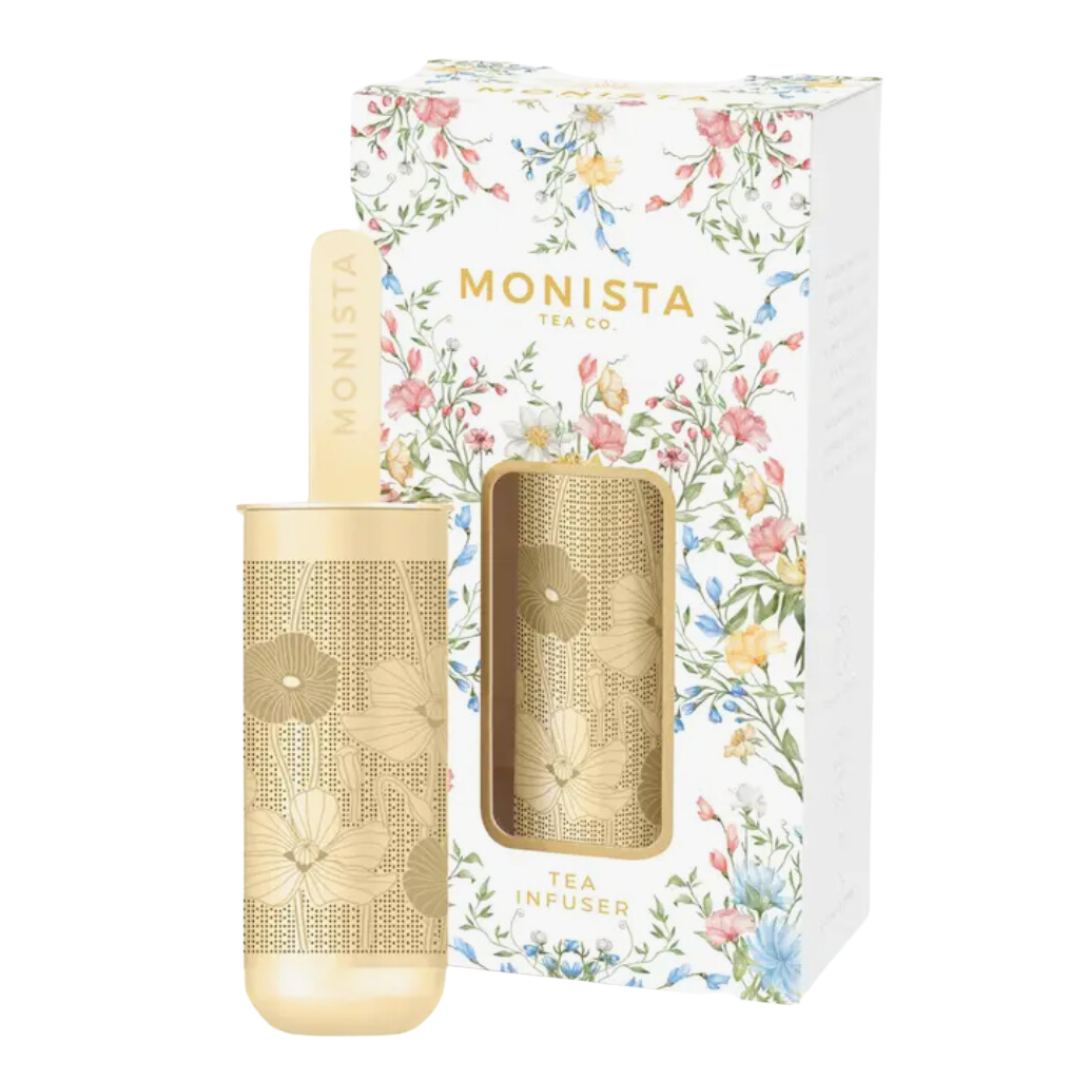 Gold metal tea infuser by Monista Tea Co, a sleek and stylish way to brew your favorite organic teas.