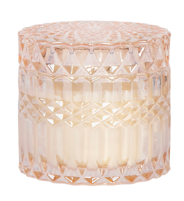 Elegant 8oz pink cut glass candle with vanilla rose scent and matching lid.