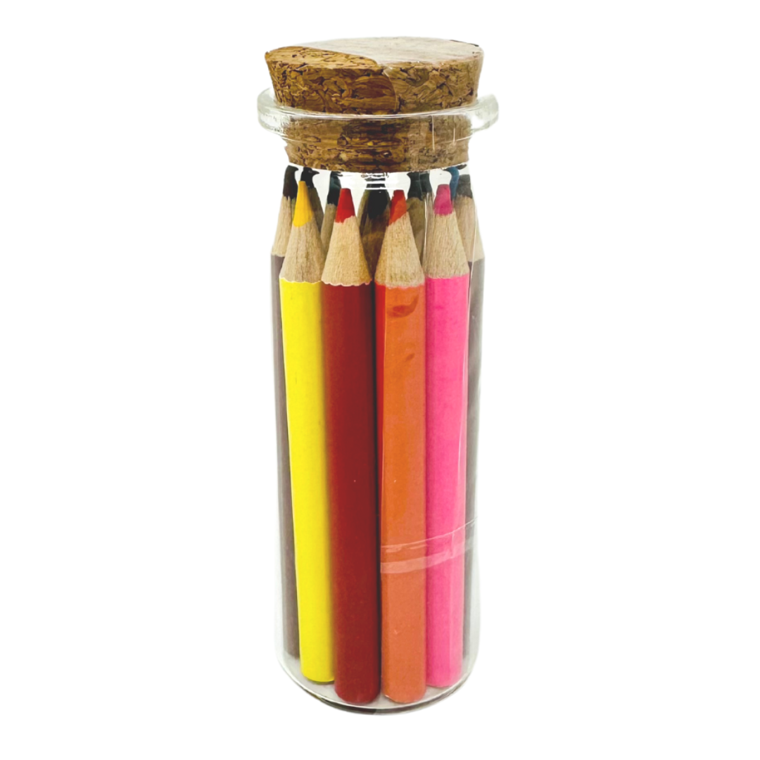 Vibrant colored pencils in a glass jar with cork top, ready for creative expression.