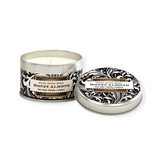Michel Design honey almond tin travel candle. Honey Almond Soy Wax Tin Candle – A delightful blend of sweet honey and warm almonds. Elevate your senses with this exquisite candle, perfect for relaxation. Add it to your personalized Me To You Box now!