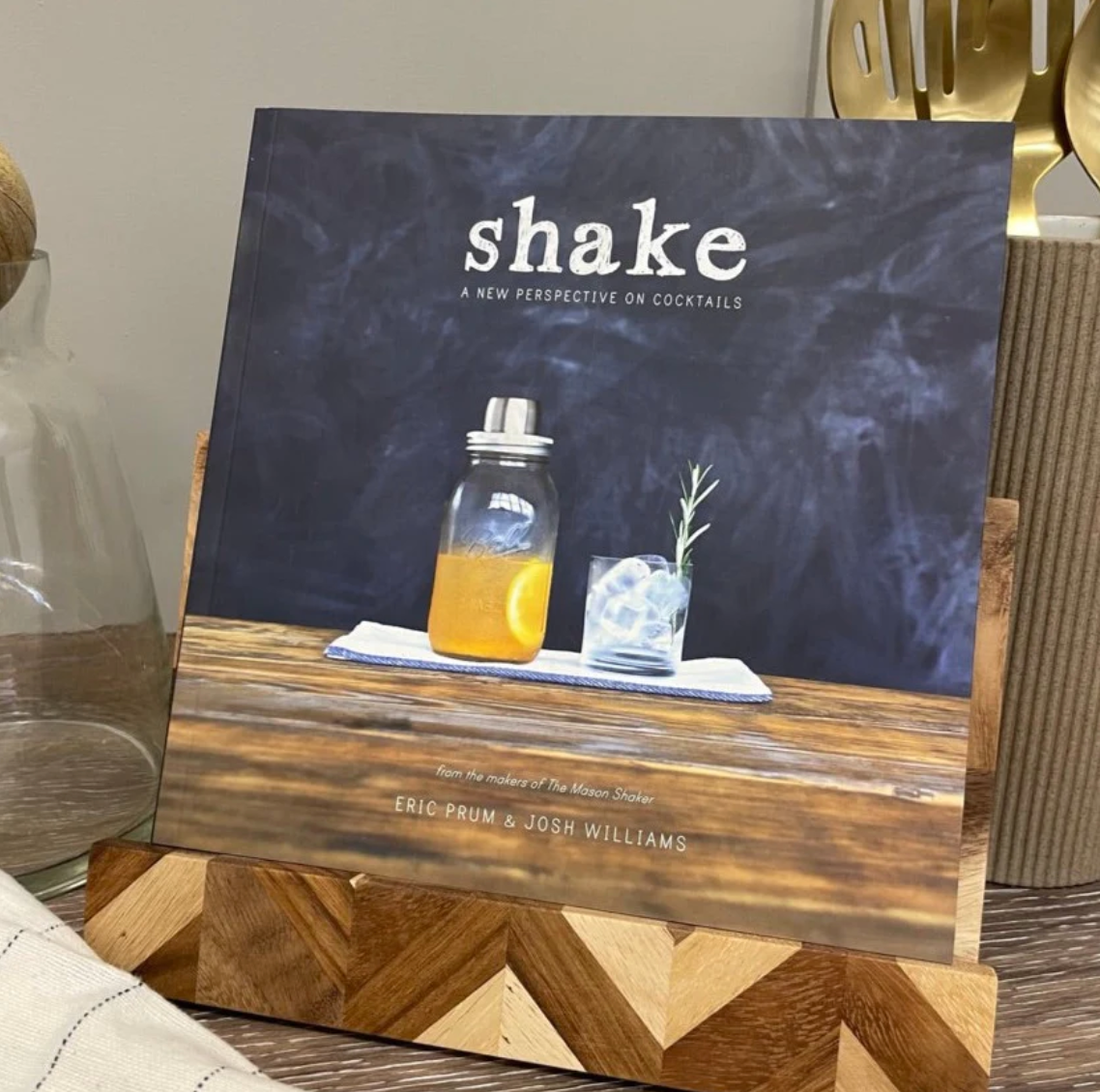Explore the Shake Cocktail Book – a mixologist's delight filled with creative concoctions. Elevate your mixology skills with this essential guide, available for inclusion in your custom gift box at Me To You Box.
