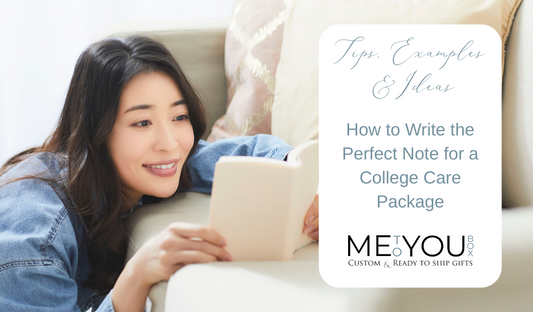 Young woman with dark hair and a blue shirt reading a card and smiling.