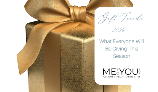 A white background with a gold gift box and gold ribbon.