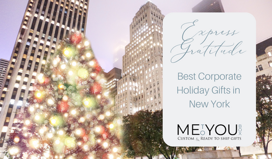 Me To You Box blog featuring the best holiday gifts for employees in New York State. The blog features an image of NYC at night time with a lit christmas tree outside the city buildings.