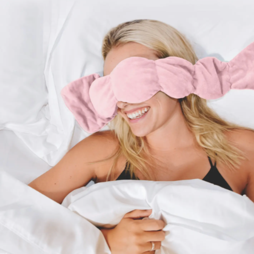 Nod Pod Pink Weighted Sleep Mask - a soothing sleep aid for restful nights with gentle pressure and calming warmth.