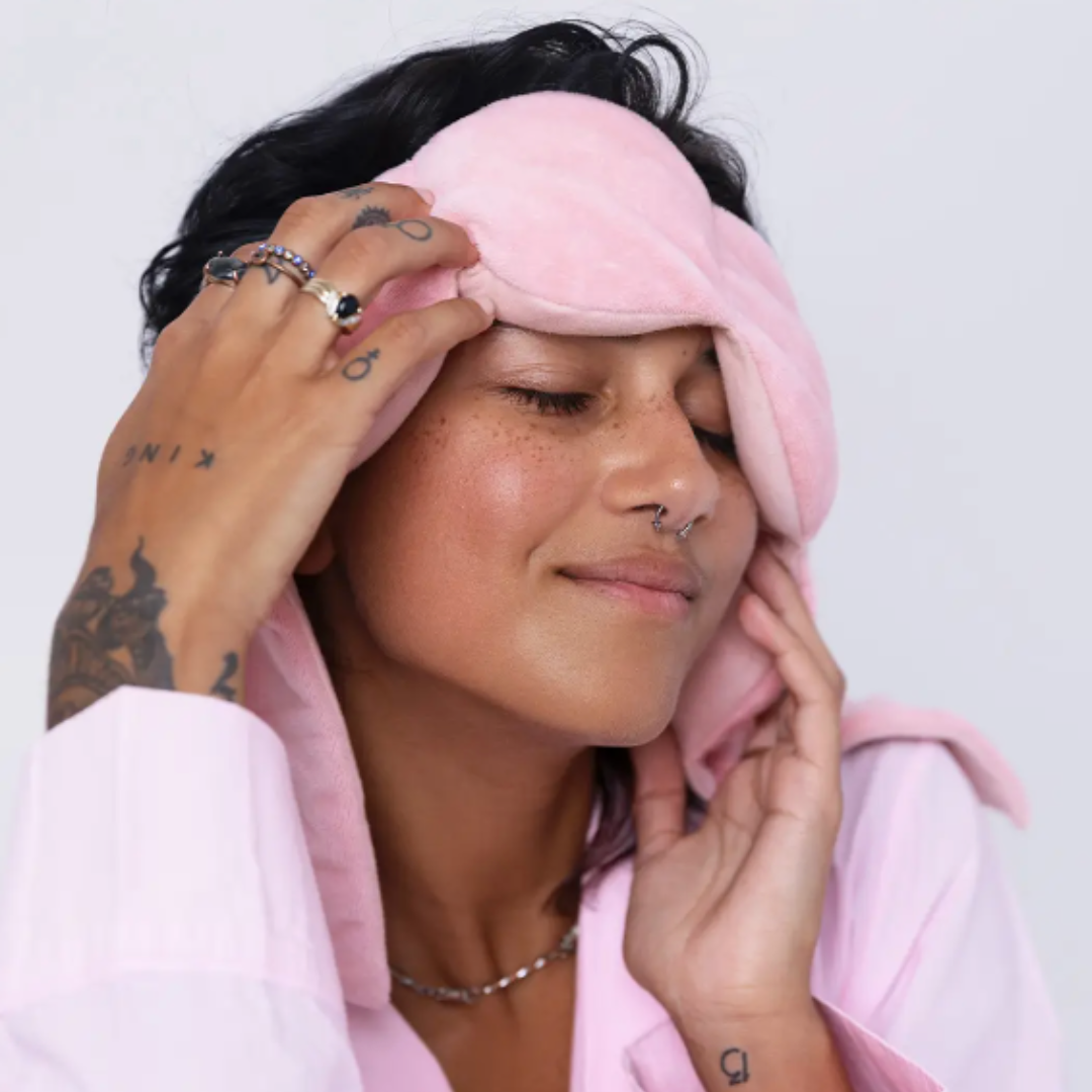 Experience tranquility with the Nod Pod Pink Weighted Sleep Mask, providing comfort and darkness for deep, rejuvenating sleep.