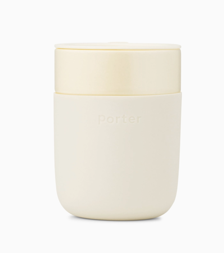 12 oz white ceramic mug with a cream silicone sleeve, showcasing a sleek and modern design by W&P on a white background.