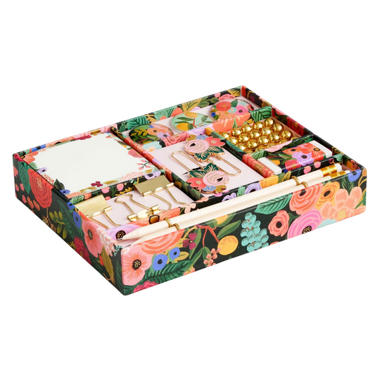 Decorative tackle box filled with desk essentials in garden party style.