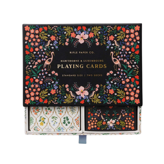 Elegant dual deck cards in floral box.