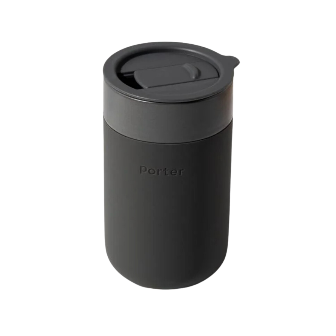 A 16 oz ceramic mug in charcoal color, with a silicone sleeve for insulation and a secure hold, ideal for hot beverages.
