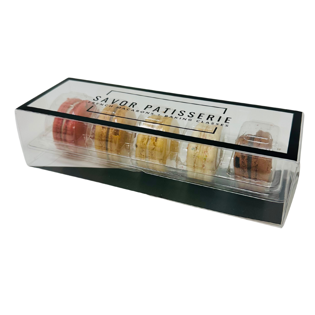 Vibrant 5-pack of classic French macarons by Savor Patisserie: a burst of colors in delightful flavors.