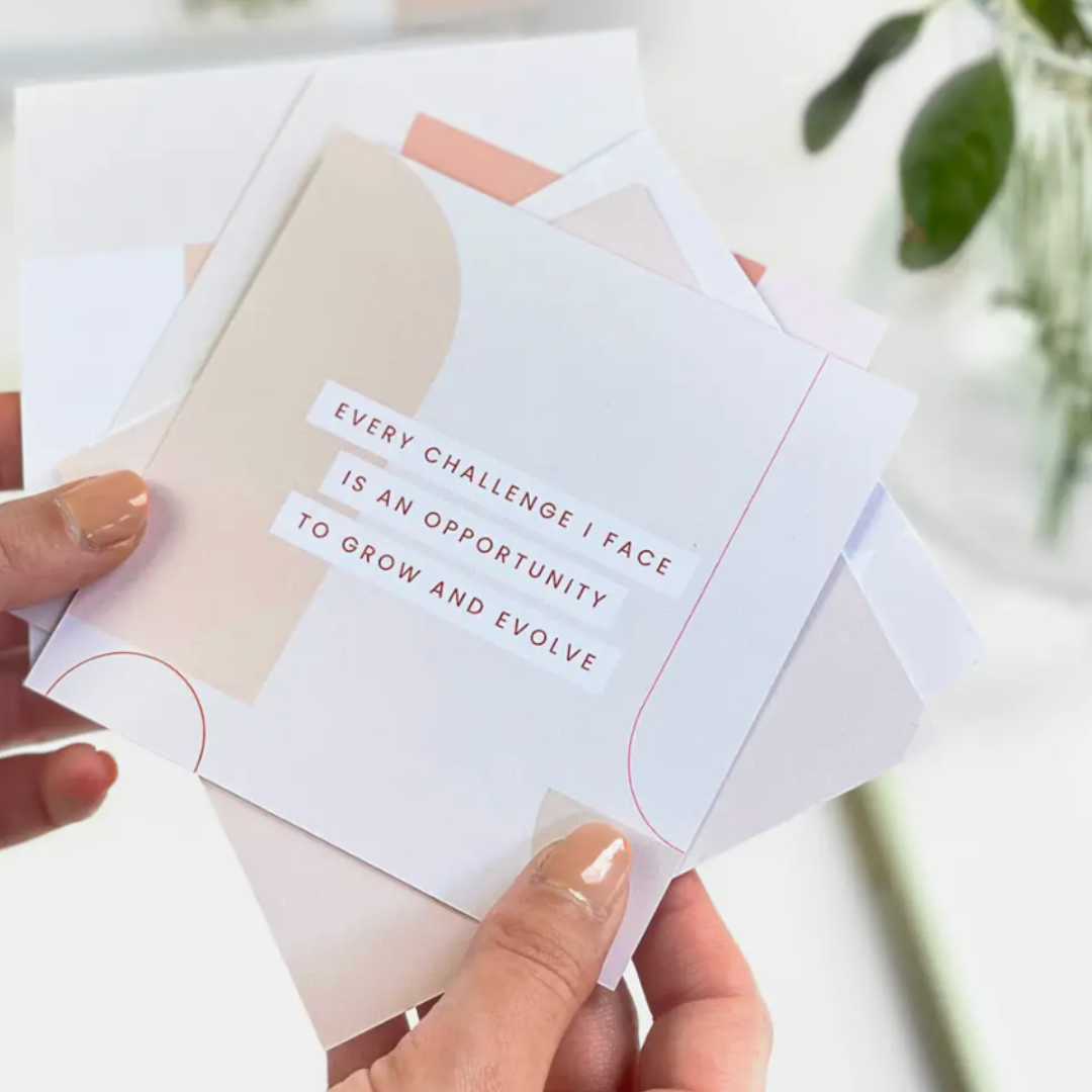 positive quotes on small cards with a wooden display base