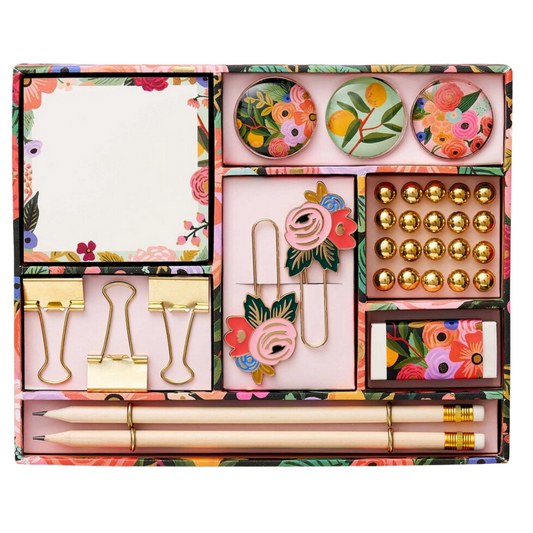 Floral illustrated paper-wrapped box filled with office essentials. Includes 1 tear-off pad of paper, 3 magnets, 2 enamel paper clips, 20 gold push pins, 1 white eraser, 3 gold binder clips, and 2 pencils.
