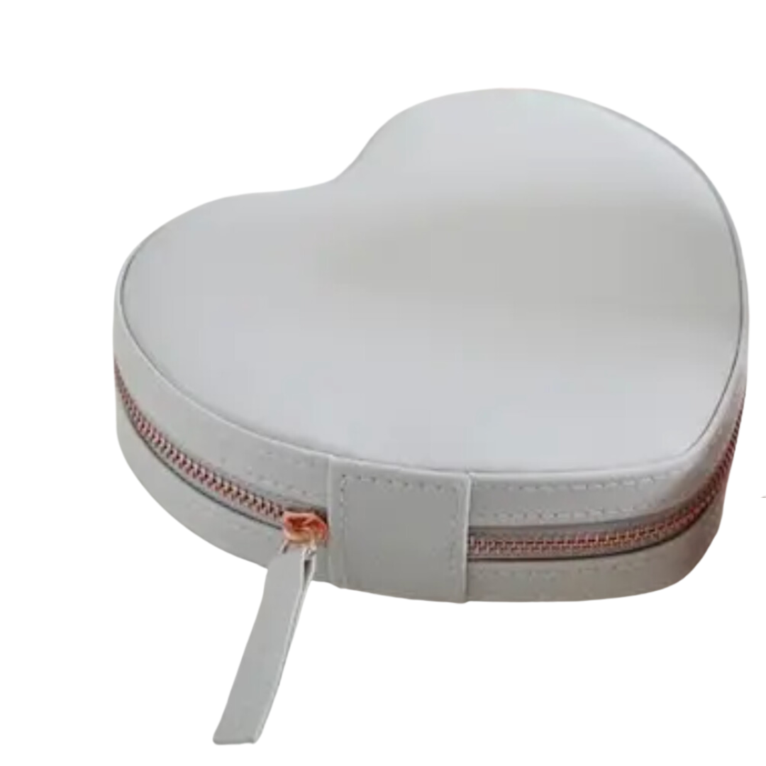 Chic grey heart-shaped jewelry case with zip closure for stylish travel storage.