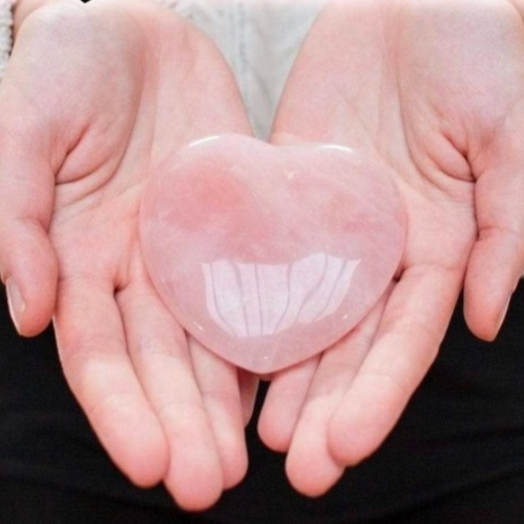 Captivating heart-shaped rose quartz, radiating soft pink hues, embodies affection and emotional healing.