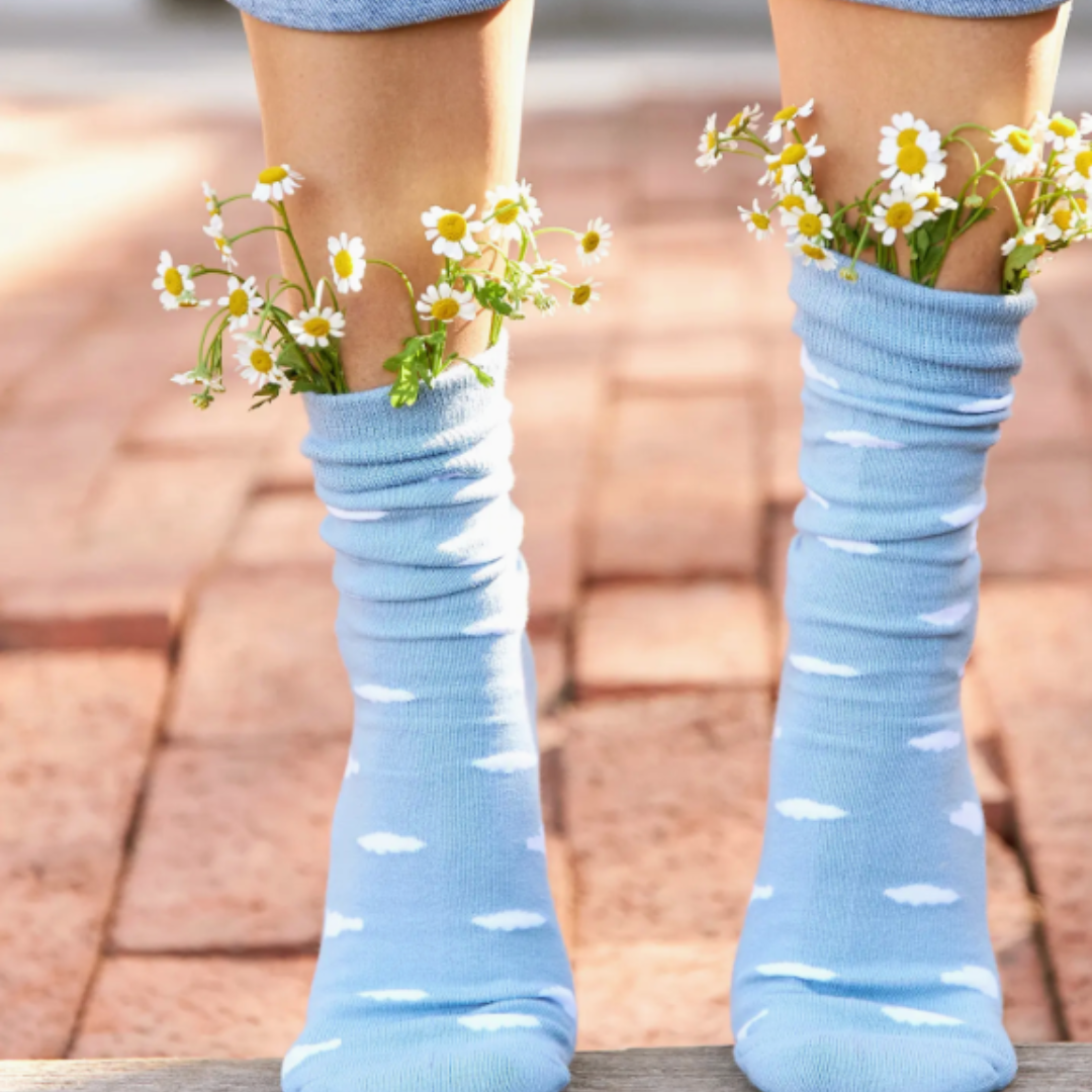 Cloud-patterned calf socks: promoting calm and positivity.