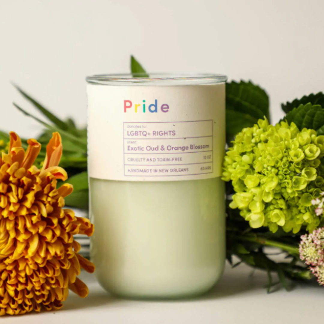 Light up love: 12oz LGBTQ+ Woodsy Citrus Scented Candle - A beacon of pride, filling your space with a harmonious fragrance.