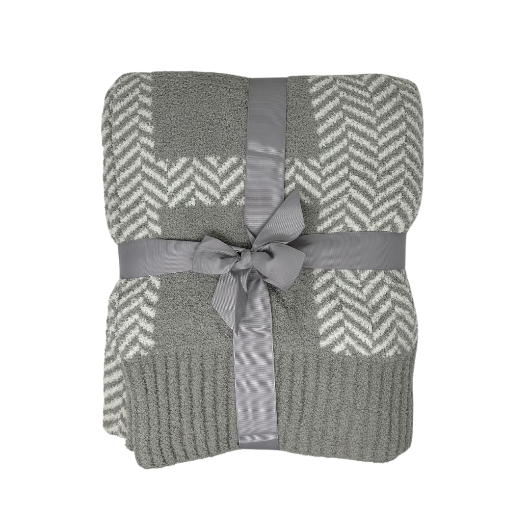Elevate your comfort with the exquisite Luxury Knit Grey and White Herringbone Throw Blanket – a stylish blend of sophistication and warmth. Add it to your Me To You Box for the perfect customized gift experience.