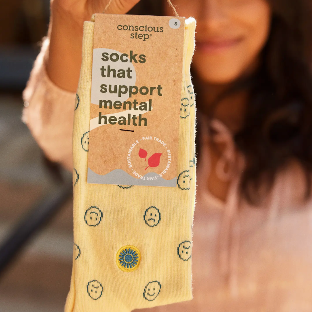 Brighten your steps with smiley face socks from Conscious Step, spreading joy and supporting mental health initiatives.