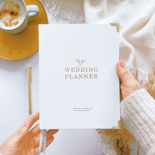 Elegant gold-accented wedding planner for your dream day.