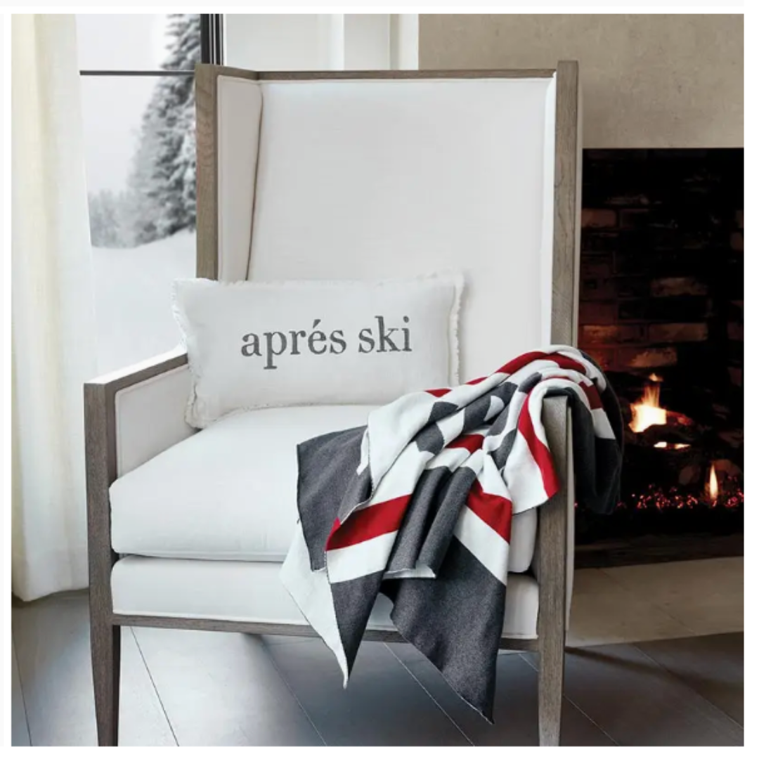 Warm and inviting 50x60 inch charcoal cotton throw blanket with 'Aprés Ski' design in red and white, ideal for adding comfort and style to your space.