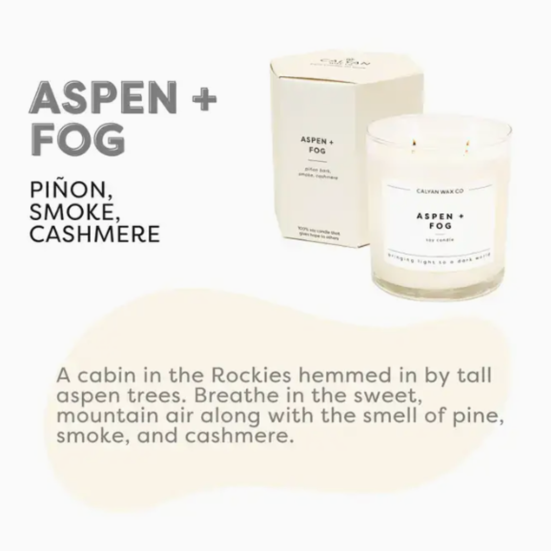 12.5-ounce soy wax candle named 'Aspen and Fog,' with a label that evokes the fresh, crisp scent of aspen trees and misty fog, designed to create a relaxing ambiance.