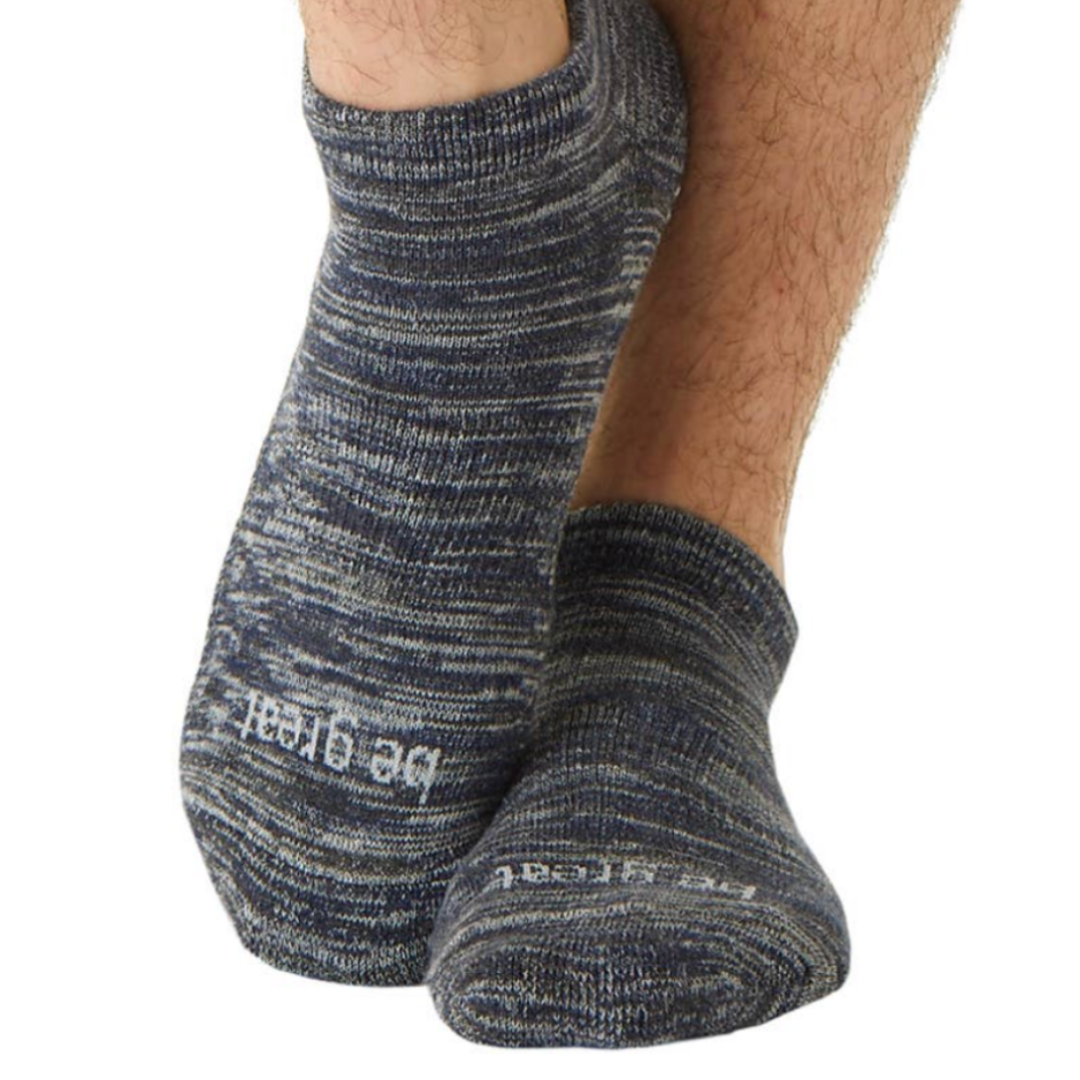 Dark grey marled grip socks with the words "Be Great" on the bottom of each sock by Sticky Be Socks.