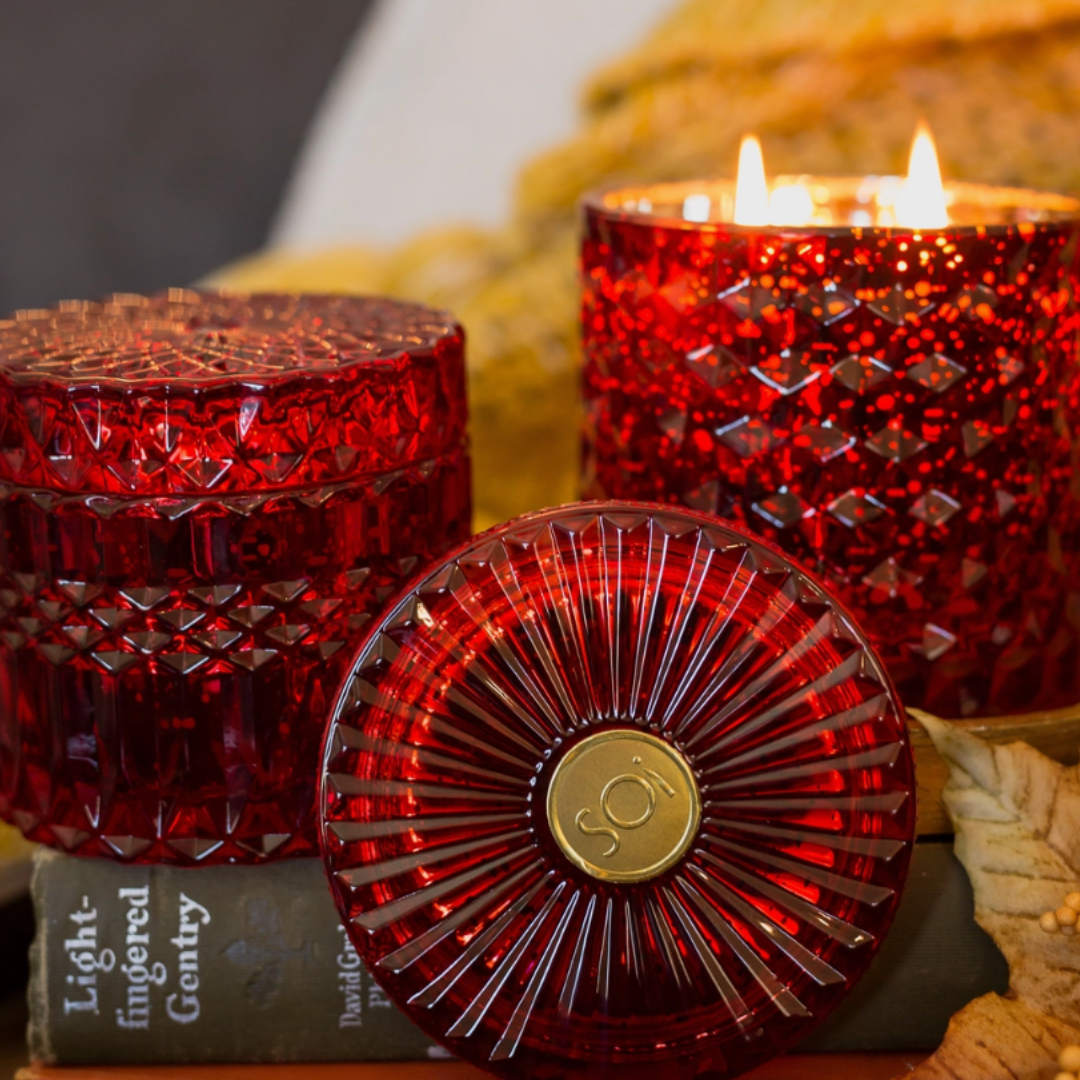 Gorgeous red shimmer cut glass encompassing a soy candle and matching lid. Scents of spices for a forty hour burn time.