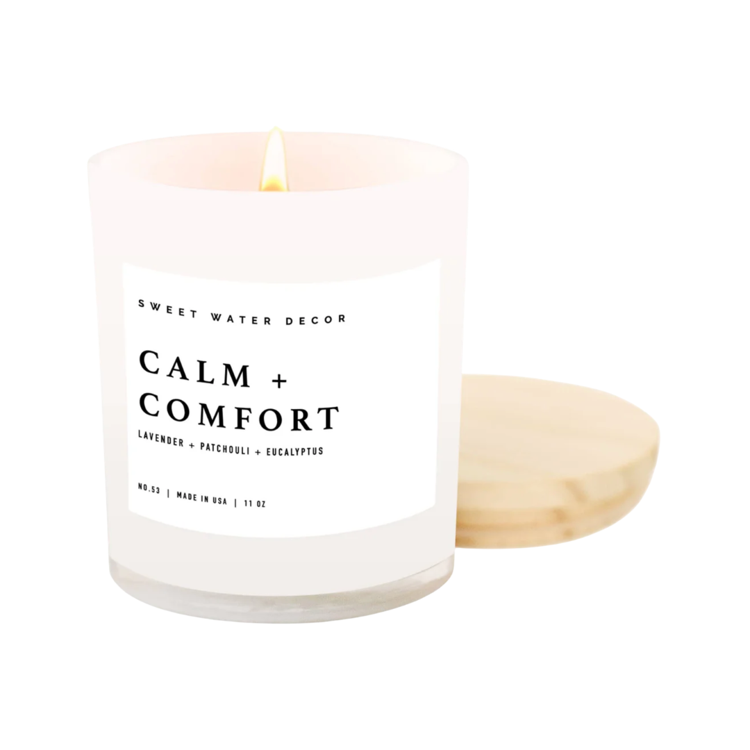 Candle with 'Sweet Water Decor' label on a white background