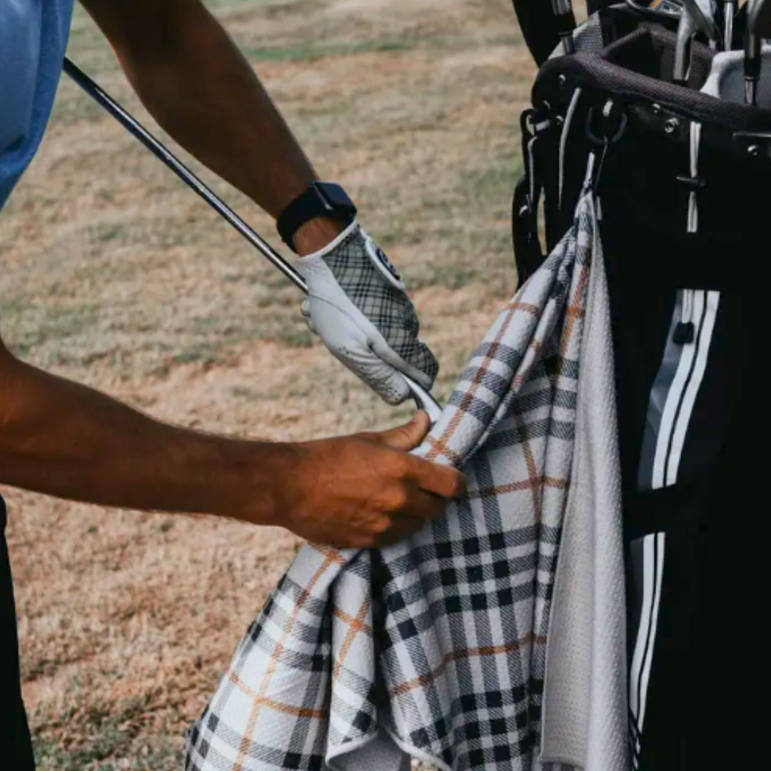 High-performance golf towel featuring a classic plaid design, perfect for keeping gear clean and dry.