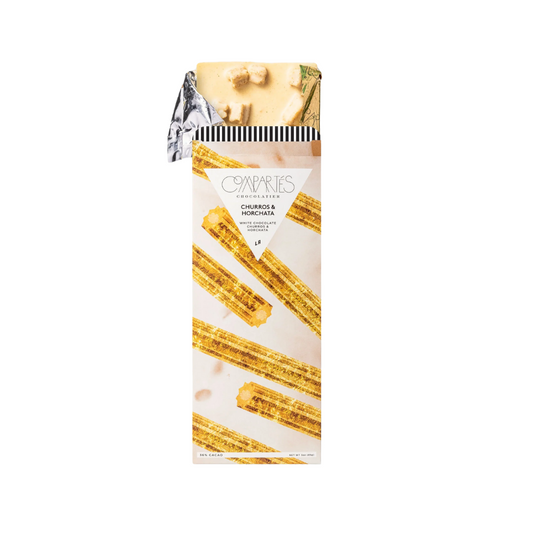 Compartés Churros & Horchata Chocolate Bar featuring elegant packaging and artisan chocolate infused with cinnamon and creamy horchata flavor.