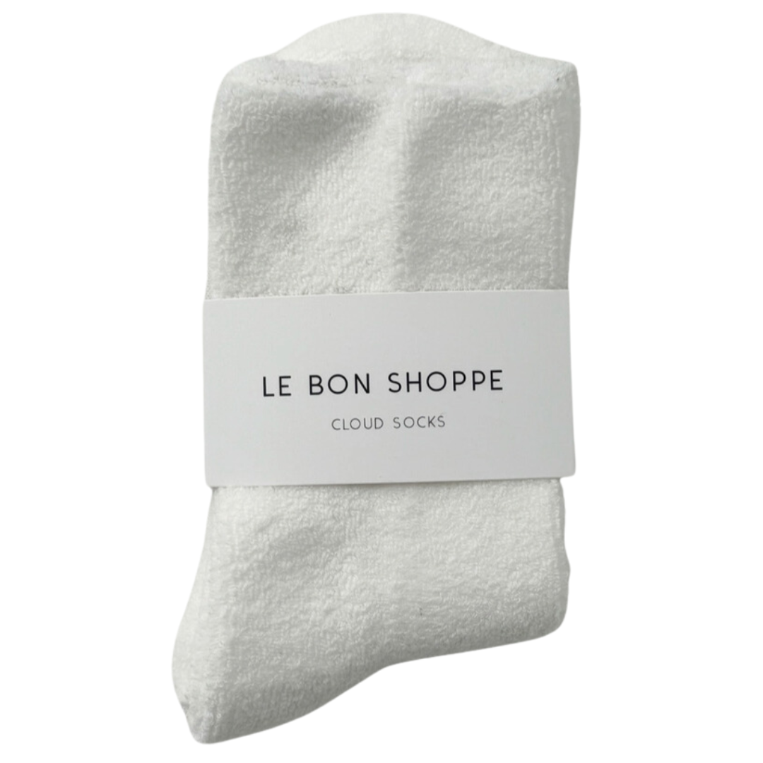 Fluffy and cushiony Cozy Cloud Socks made from a breathable terry cotton blend, designed to provide cloud-like comfort for lounging or pairing with shoes.