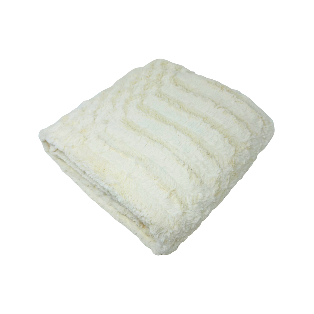 Cream cozy blanket with texture folded and shown on a white background.