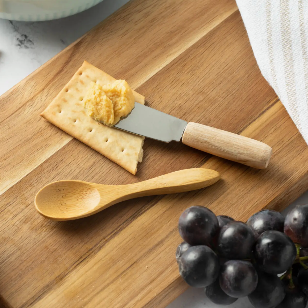 Elegant small wooden spoon designed for dipping spices, with a smooth finish and compact size, perfect for enhancing your appetizers or gourmet dishes.