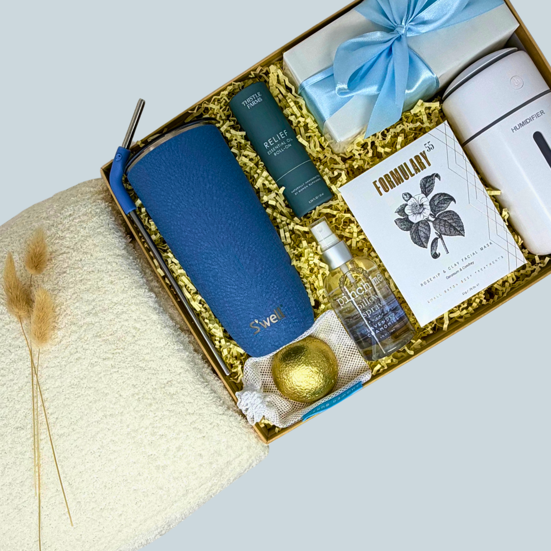 A gift for people not feeling well with a blanket, tumbler, humidifier and more.