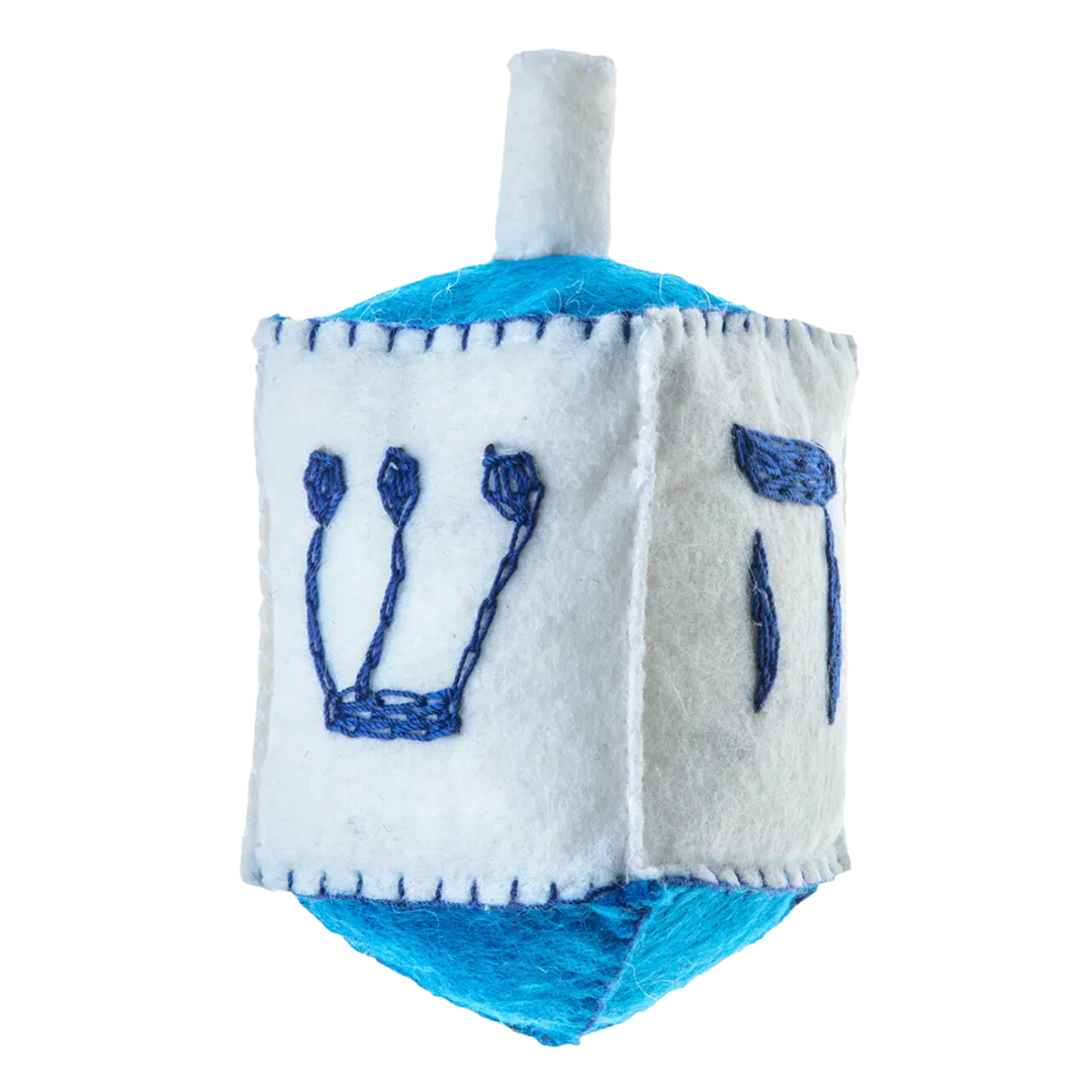 Close-up of a 4-inch felt dreidel designed for Hanukkah. The dreidel features vibrant, classic colors and is crafted from high-quality felt. It is ideal for enhancing holiday decor and can be hung easily to add a whimsical touch to Hanukkah celebrations.