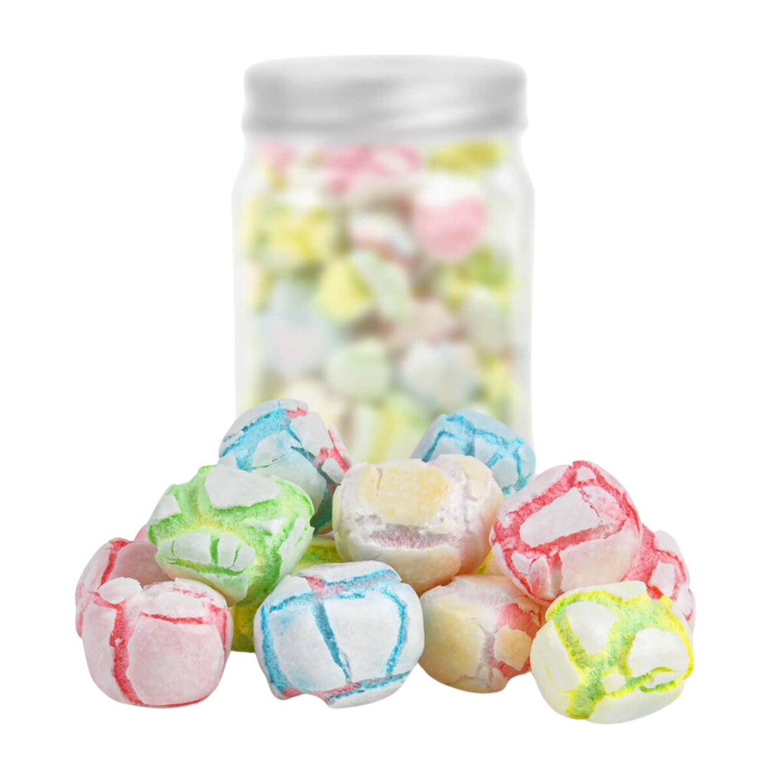 A 1.8oz jar of Popinsanity Freeze-Dried Candie-Mallows, filled with pastel-colored marshmallows. These light and crispy treats are perfect for Easter gifting, with a delightful crunch and vibrant appearance, all while being eco-friendly with a resealable, recyclable container.