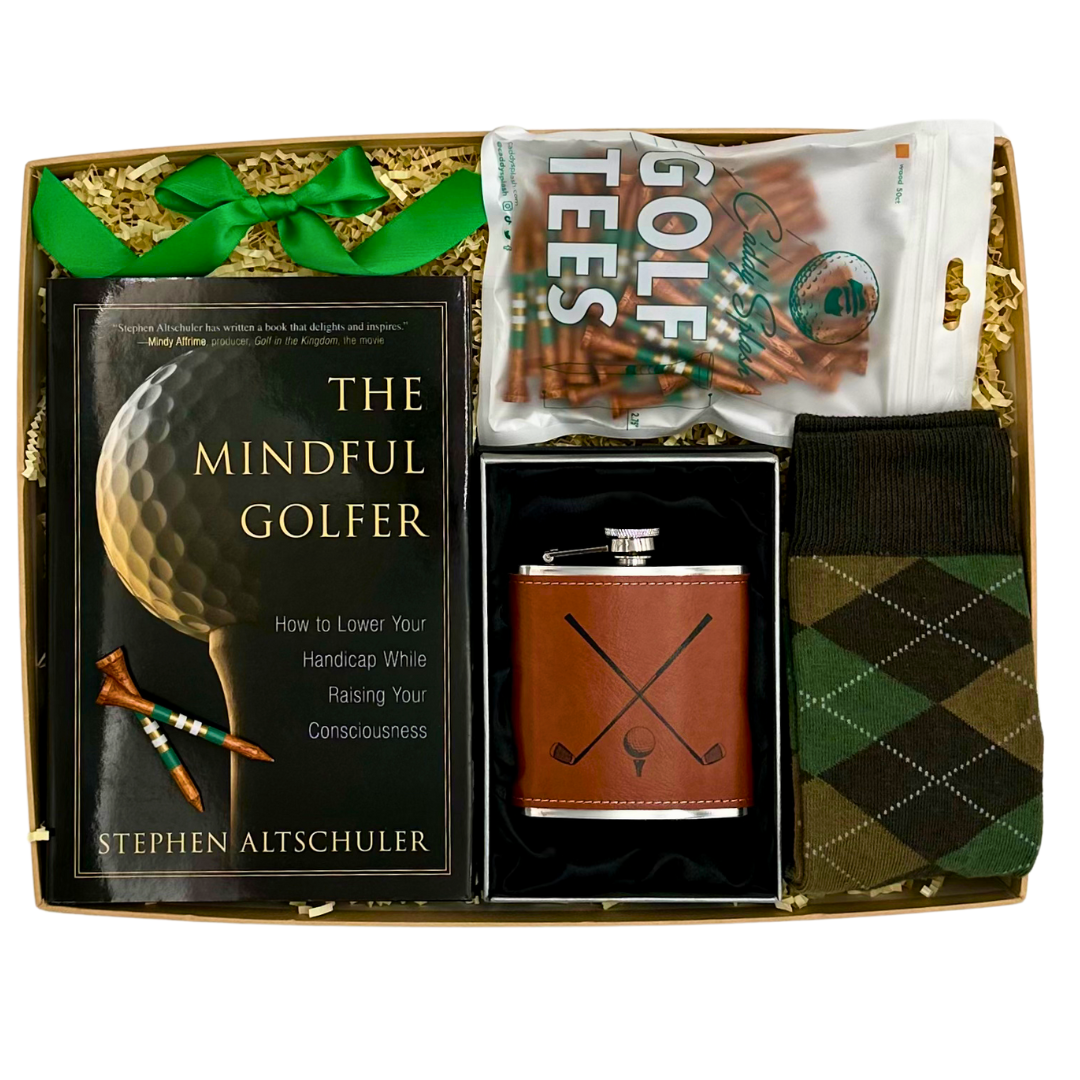 The TEE TIME GOLF GIFT BOX by Me To You Box, beautifully presented and filled with premium items for golfers: trendy argyle socks, a sleek golf-design leatherette hip flask, a reflective Zen-inspired golf book, and durable painted golf tees. A perfect gift for any golf lover, showcasing quality, attention to detail, and a passion for the sport.