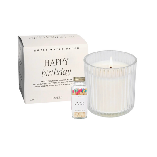 Wish someone Happy Birthday with this 11oz soy wax candle in clear glass jar.  The fluted glass jar candle comes in a white box with black letters that read Happy Birthday. Also included is a glass jar with natural wooden matches and multicolored vibrant tips.