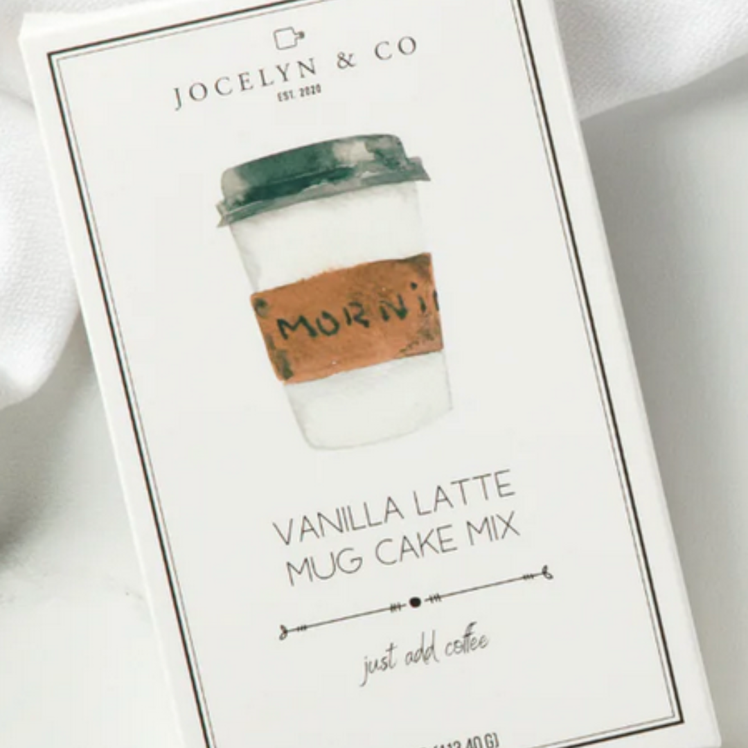A box of vanilla latte flavored mug cake mix, featuring a cozy coffee shop-inspired design with image of a coffee cup, highlighting the convenience and indulgence of homemade mug cakes.