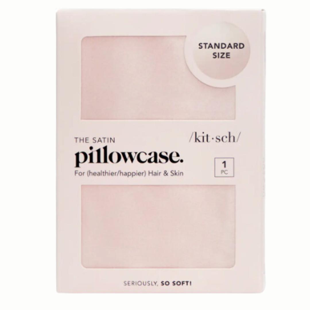 Blush pink satin pillowcase designed to provide comfort during breast cancer treatment. Its smooth texture helps minimize skin irritation and reduce friction on sensitive skin, offering a gentle touch that is kind to both skin and hair.