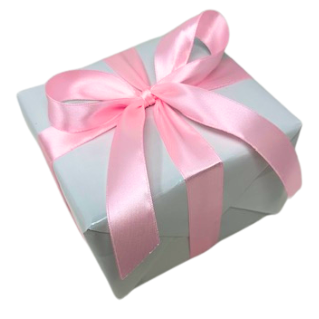 Rectangle box gift wrapped in white paper with a beautiful pink satin bow and ribbon.